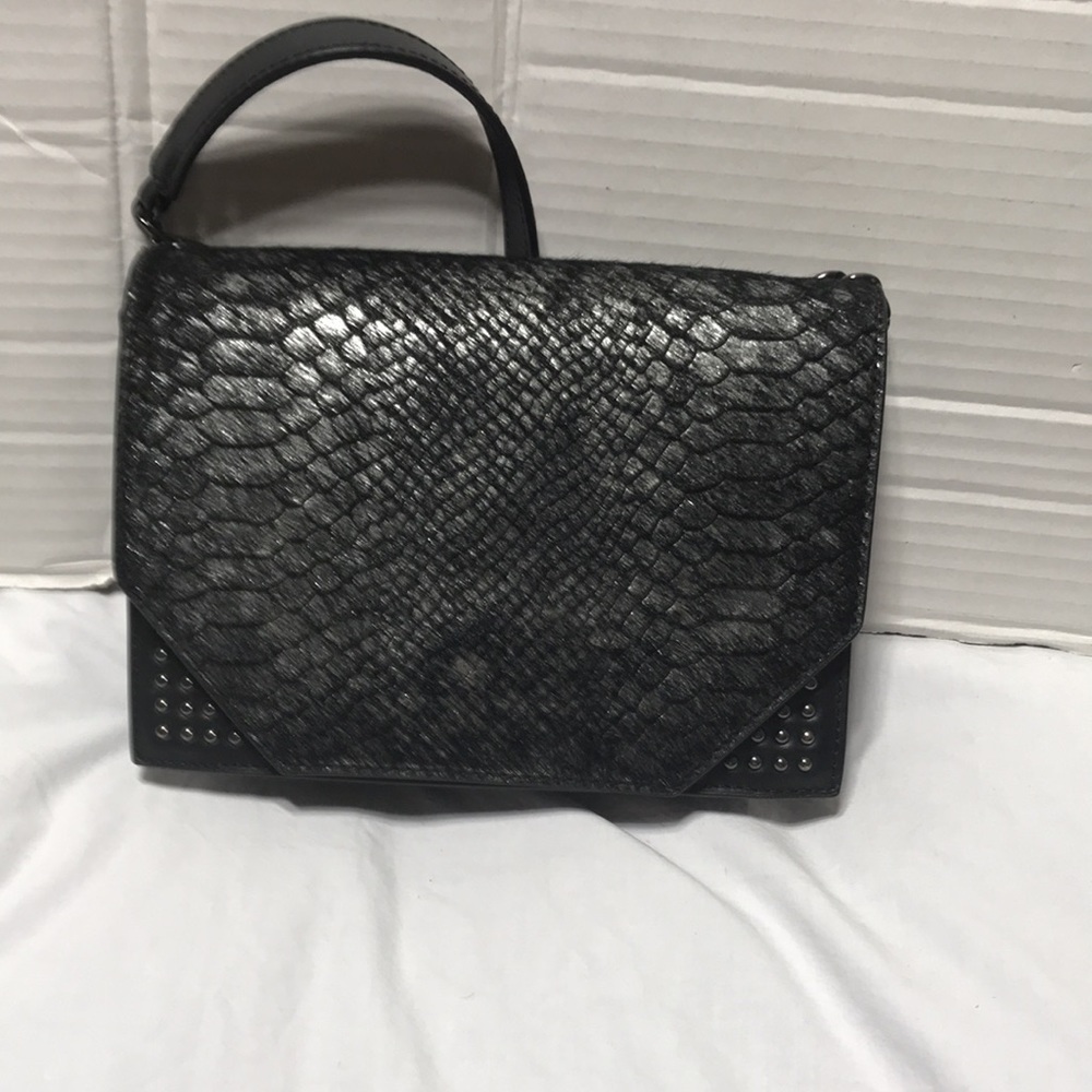 Linea Pelle Black leather shoulder bag with black hardware and studs. NWOT